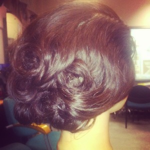Hair up created by finger waving and pin curls