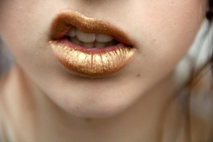 gold eyeshadow made into lipstick
