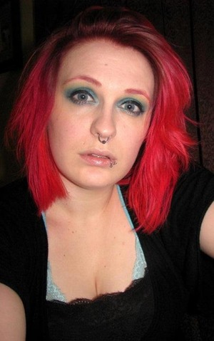 Maroon to pink fade with matching eyebrows.