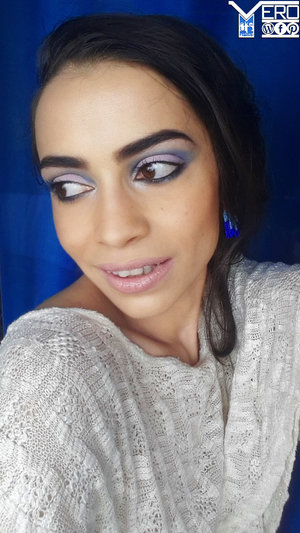 cut crease makeup style in shades of blue and lilac