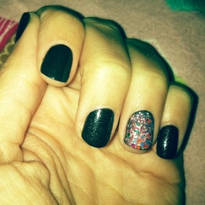 Winter nails with a fun pop of glitter for an accent nail.