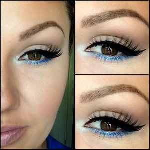 Used neutral colors on my eye, with a winged liner. I used a light blue shadow for my bottom liner, and added false lashes to finish the look. (The bottom mascara is blue!)