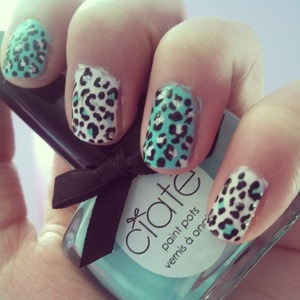 Light blue leopard nails