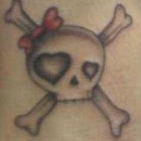 Skull With Bow Tattoo