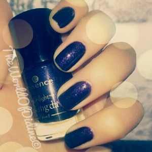 NOTD with the Twilight Collection of ESSENCE COSMETICS.
It is a black color with purple glitters. 
Instagram : theworldofdidine