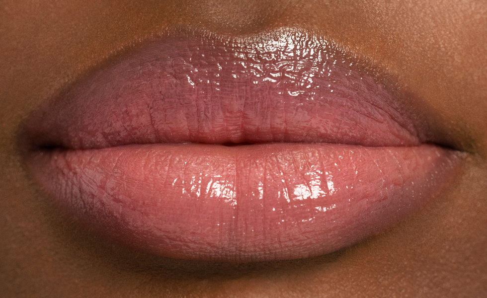 Model wearing Chantecaille Lip Sheer in Gossamer