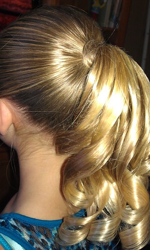 i did my friends hair for cheerleading. held up great!(with two cans of hairspray) :)