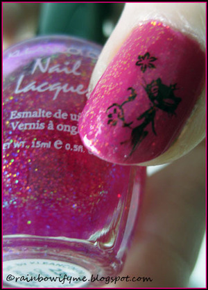 Orly ~ Hawaiian Punch with Klean Color's Holo Fuschia as a top coat. 
See more at my blog:
http://rainbowifyme.blogspot.com/2011/11/orly-hawaiian-punch.html