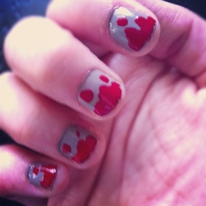 My attempt at bloody "zombie" nails for Halloween. (colors used: Orly Faint Of Heart & SpaRitual Hunk of Burnin' Love)