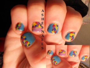 An abstract bouquet with dotting tools! Unlisted colors- LA Colors Yellow striper, SH-Hard as nails No hard feelings and Limestone, Essie silk  cord, CG- Caribbean Blue