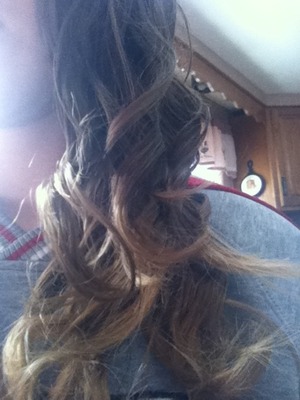 My sister is curling my hair for a game were going to tonight!