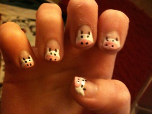 Pink nail polish
Black and white nail polish
Clear overcoat
