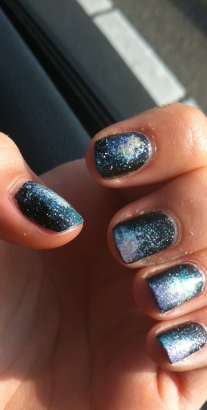 These galaxy nails are made by my friend Charid H. ! This design can also be put on short nails as mine! This is a clearer picture of the nailss