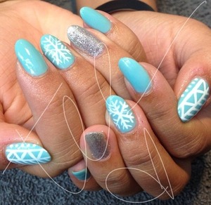 Glitter, Aztec print, and a snowflake on a Tiffany blue base