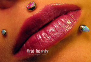 Virus Insanity lipgloss, Cadaverous.
http://www.virusinsanity.com/#!lipglosses/vstc9=all-lipglosses/productsstackergalleryv29=0