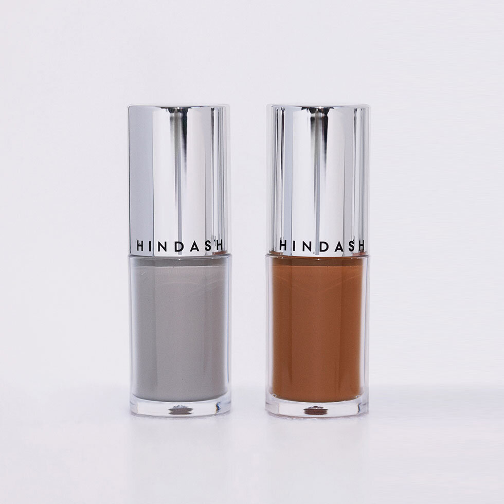 Models wearing Hindash Color Fluid in Concrete and Sculpt