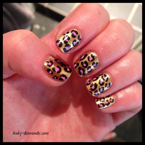 Gold and pink leopard print nail art