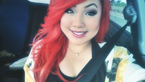 When I first dyed my hair red, I used L'Oreal Excellence HiColor HiLights in Red. To retouch my hair I used Manic Panic's Pillarbox Red mixed with Red Passion :)
