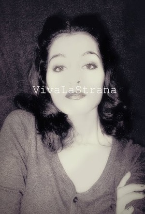 I love pin up and the whole 1940-50's fashion and makeup. here I caked on some foundation, used dark brown on my eyelid crease then made a dramatic cat-eye. 