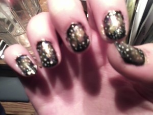 My attempt at the galaxy nails.  Sorry for awful resolution.  I took it on my phone.