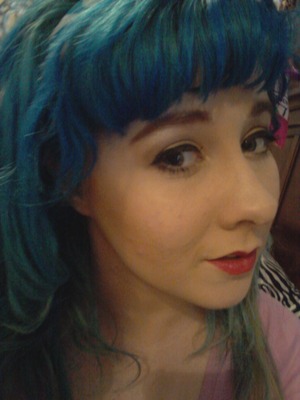 I curled my day old hair and a wing eyeliner 