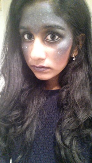 I went as a galaxy for halloween, all makeup done by hand and with an array of brushes. I couldn't find white liquid eyeliner so the white dots were done with white striping nail polish xD took me around an hour, hour and a half to do!

products used:
skin
-rimmel london 5 in 1 face primer
-loreal true match super blendable liquid foundation
-loreal bb cream in medium
-rimmel London stay matte pressed powder in translucent
galaxy
-nyc eyeshadow base in nude
-Revlon diamond lust eye shadow in 120 night sky
-maybelline color tattoo 24 hour cream eyeshadow in 20 painted purple
-wet n wild eyeshadow pallete in 738 comfort zone (the definers)
-wet n wild eyeshadow palette in 736 petal pusher
-Revlon illuminance creme shadows in 720 moonlit jewels
-maybelline eye studio in 20 sapphire siren
-maybelline eye studio color explosion in 10 amethyst
eyes
-maybelline classic black (yellow tube) mascara
-layered with cover girl clump crusher mascara
-loreal lineur intense liquid eyeliner in carbon black
-nyx retractable eyeliner in MPE01 white
-ikonic gel eyepencil in quicksilver
-Victoria secret beauty rush liquid glitter in platinumania
