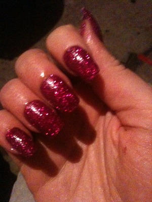 Glittery pink nails all done with glitter and not nail vanish !