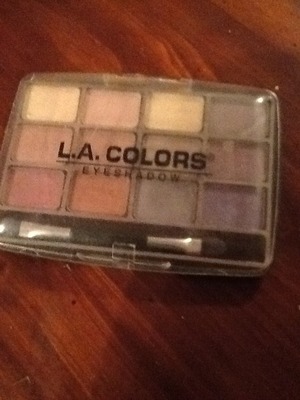 This is L.A. Colors eyeshadow. The color is called chic....it's got pinks, purples, and some neutrals! These are only $1 and are very great eyeshadows!
