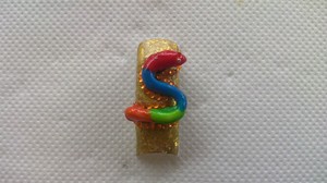 "Kill(h)er python"
Acrylic top, gold foil cover, acrylic sculpted snake with free hand polish, diamantés 