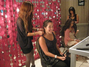 My friend Camila getting her hair braided at the Wella hair braid bar