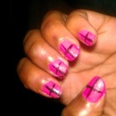 Cross Design with Pink Polish and also Black Polish 