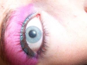 80's style blue, purple and pink eye.