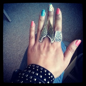 Wing ring with multi color nail art and belted bracelet
