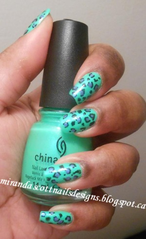 I used China Glaze In the Lime Light (Neon) and Sally Hansen Virtual Violet. I also used Sally Hansen nail art pen in black for the leopard prints. 