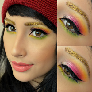 Gold brows inspired by shrinkle on brows I used goldilux by sugarpill and on ze eyes I used buttercupcake, acidberry, dollipop, love+ and flamepoint! All by sugarpill !! And lorac liquid luster in diamond in the inner corner of my eye! On the lips I used an occ lip tar in grandma.