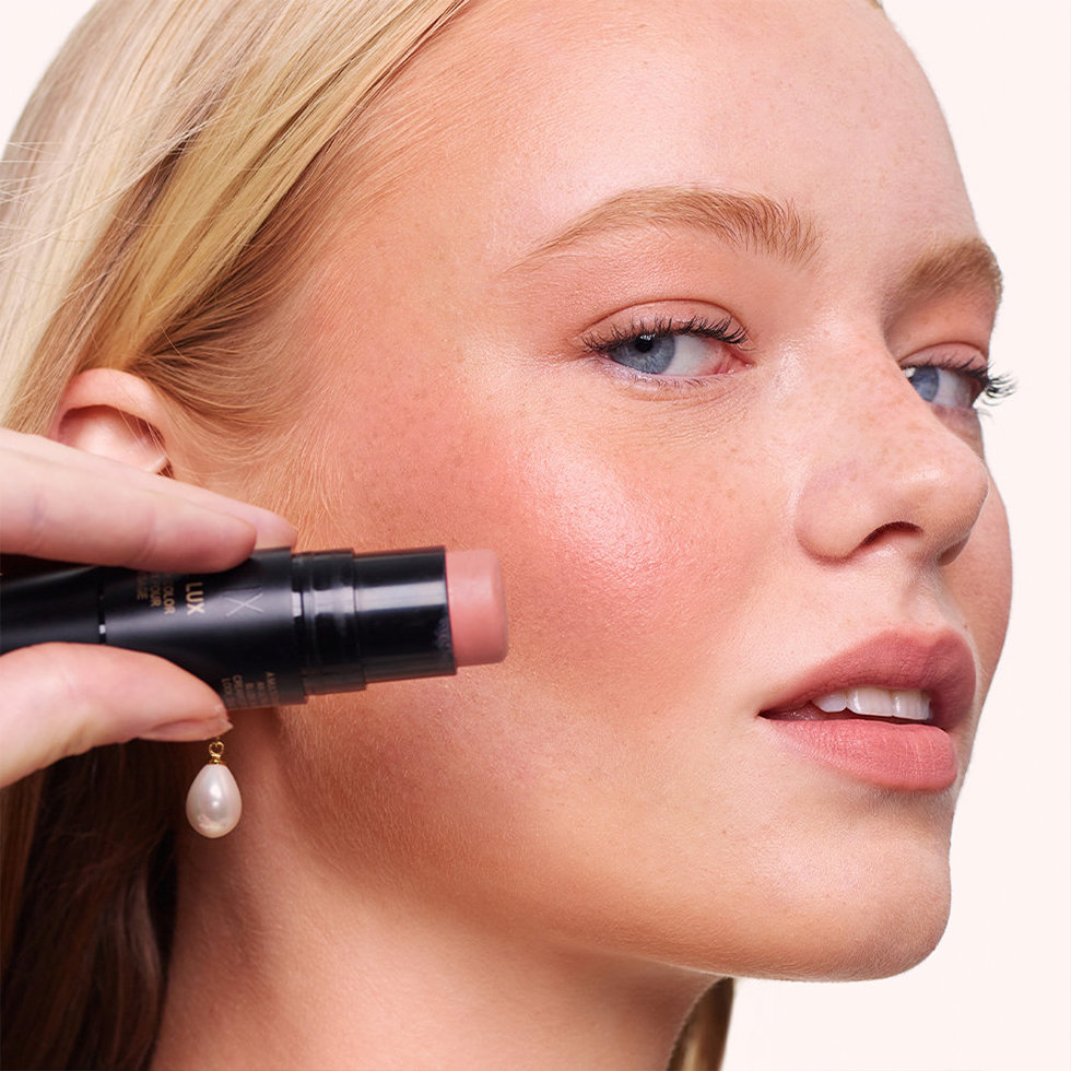 Nudestix model wearing the Nudies Matte Lux in Nude Buff