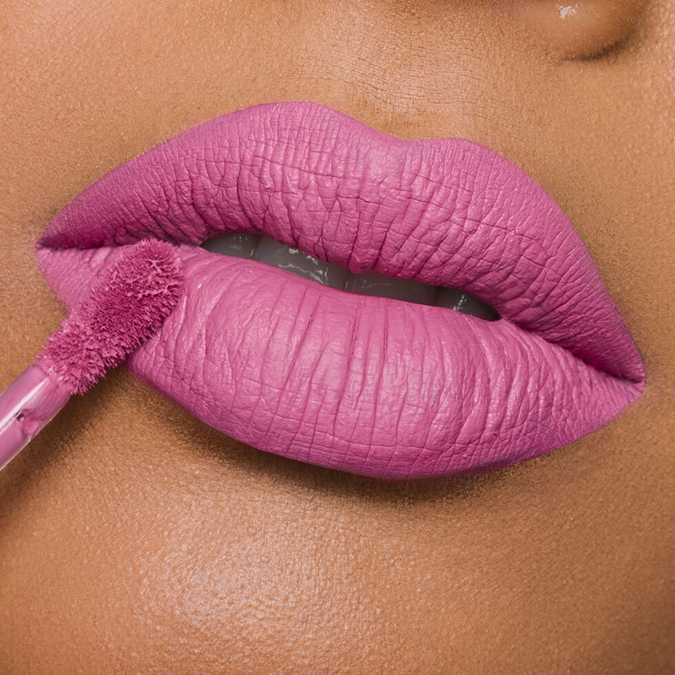 Model wearing Jeffree Star Cosmetics Velour Liquid Lipstick in C*nt