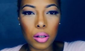 Winged Eyeliner and Pink Lipstick