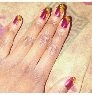 Angels blood by Sally Hansen with gold glitter 