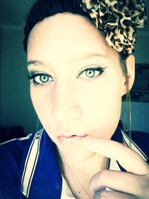 A light colour with liner and nude lip