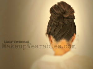 Braided ponytail into a perfect messy bun hair tutorial can be found here.

http://www.makeupwearables.com/2013/08/cute-school-hairstyles-updos-with.html

http://www.youtube.com/watch?v=P34YrMJcf24





 

