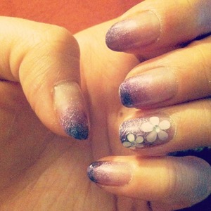 Purple nail gradient with flower stickers