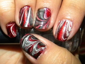 This is a water marble look done with Nabi Nail Lacquer. I just love how the colors look together :)