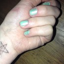 turquoise with glitter nail varnish on the top 