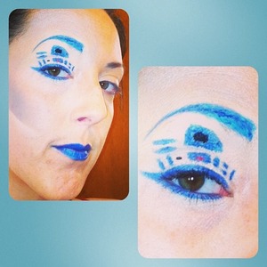 Saw this on Sugar Pills Instagram and HAD to try it. this was my first attempt, and all I used was blue eyeshadow shavings with a water/vitamin E oil mixer and an eyeliner brush. I think this would have came out much better if I had a blue eyeliner liquid or pencil. I also glued down my eyebrows and covered with concealer to make the blue eyebrow really blue. 
