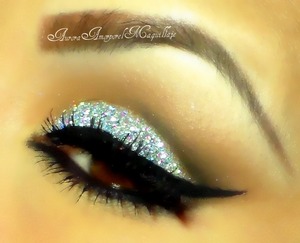 Hello this eye makeup was made in this tutorial: 
http://youtu.be/I4Tj0sF9DOM

thanks
-Aurora