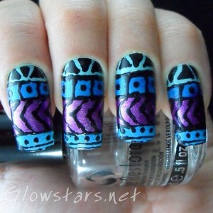 To find out how this look was achieved please visit http://glowstars.net/lacquer-obsession/2012/09/30-days-of-untrieds-tribal-print