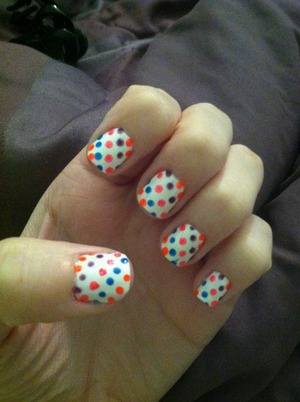 Rainbow polka dots. 
Done by me. 