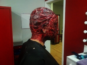 side veiw of my burn victim, bald cap, liquid latex,ben nye thick blood and make up wheels