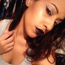 Black lips and winged liner 